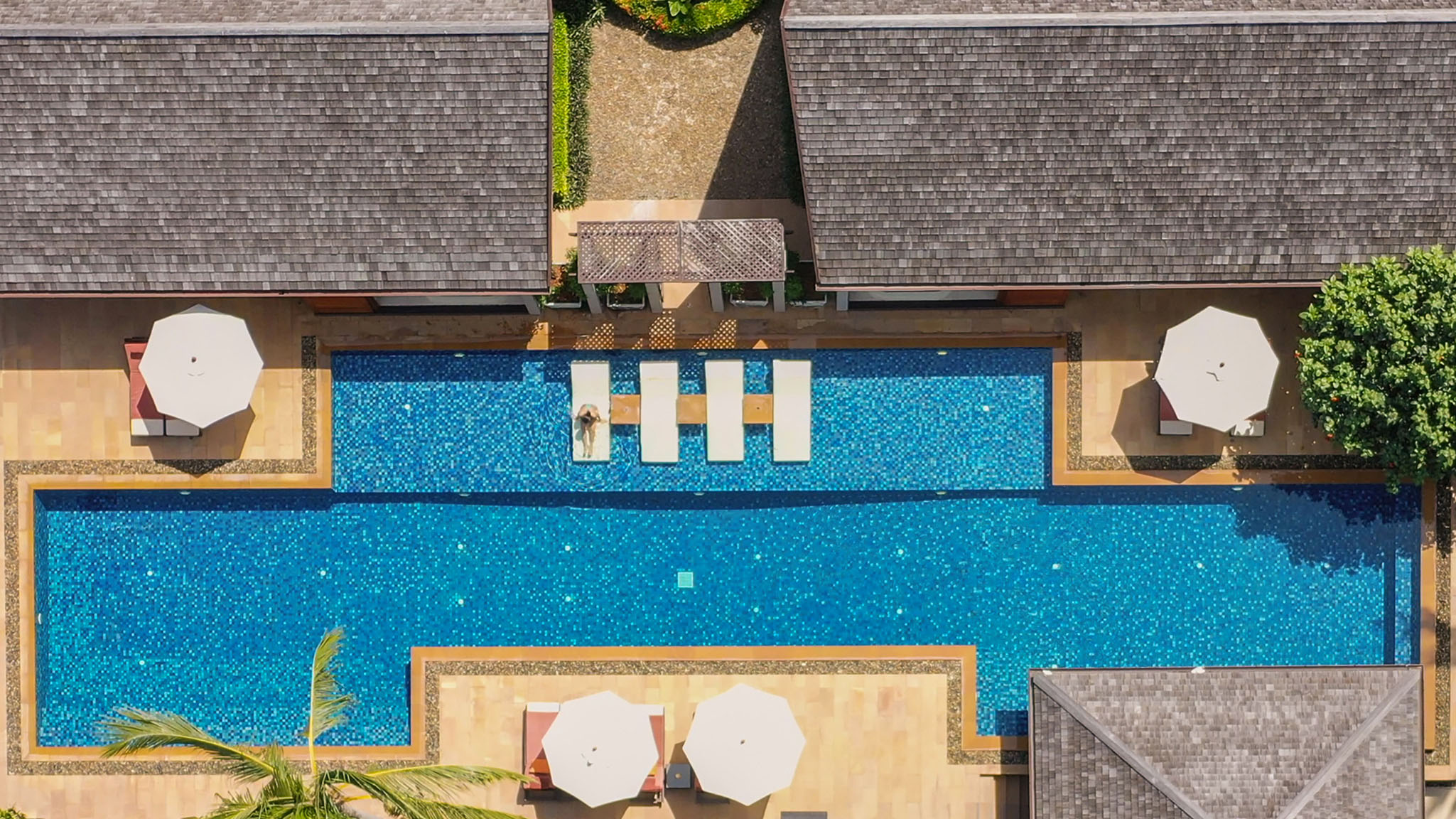Overhead view of Baan Puri's pool and pavilions